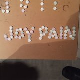love hearts spelling joy and pain
